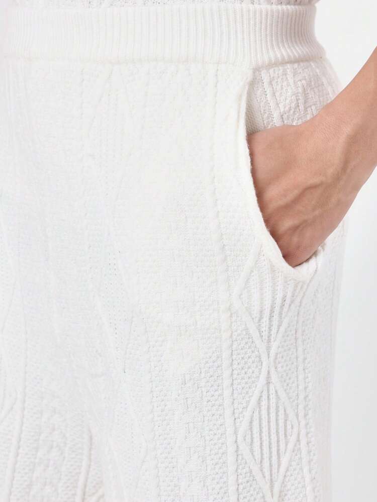 Set coordinato a maniche corte con polo in maglia a trecce