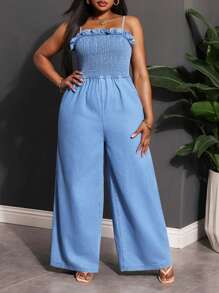 Slaydiva Jumpsuit aus blauem Denim in Große Größen mit sexy Trägern und weitem Bein