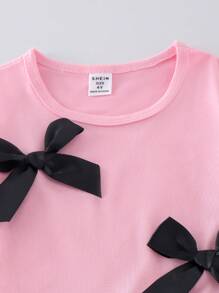 SHEIN 2pcs/Set Young Girl Casual Daily Wear Pink Short Sleeve Bow T-Shirt And Black Flare Pants, Summer Cute Outfit