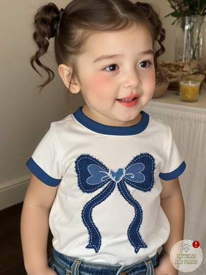 SHEIN 女婴可爱蝴蝶结印花休闲简约短袖圆领上衣，适合夏季