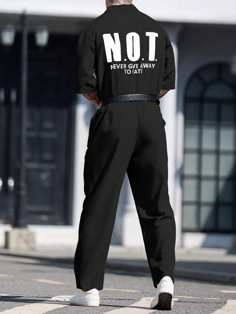 Manfinity EMRG Men's Young Street Style, Casual Sports, INS Matched With A High Street Creative Letter Design White Jumpsuit Featuring A Black And White Illustrated Magician Mask Pattern. With A Button Design And A Loose Fit, This Jumpsuit Embodies Street Rock Aesthetics, Making It Suitable For Music Festivals And Everyday Outfits. An Excellent Gift For Boyfriends Or Husbands, It Represents Streetwear And Y2K Style. It Is Also Perfect For Pairing In All Four Seasons, Especially Spring And Summer, Showcasing A Graphic Outfit. Men's Magician Mask Graphic & Letter Print Casual White Jumpsuit ,Summer - Black - View 1