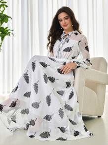 Modelyn Kleid für Damen mit Mesh- und digitalem Muster-Einsatz, Schleifenbesatz und Volant-Saum mit Langarm