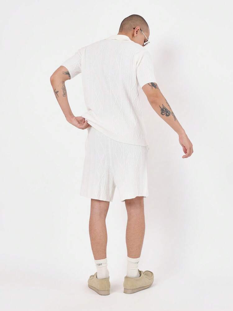 Set coordinato a maniche corte con polo in maglia a trecce