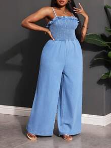 Slaydiva Jumpsuit aus blauem Denim in Große Größen mit sexy Trägern und weitem Bein
