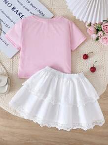 SHEIN Conjunto de blusa de punto de unicolor con decoración de moño y falda acampanada con volantes de encaje para niñas bebé, look casual y dulce para primavera/verano