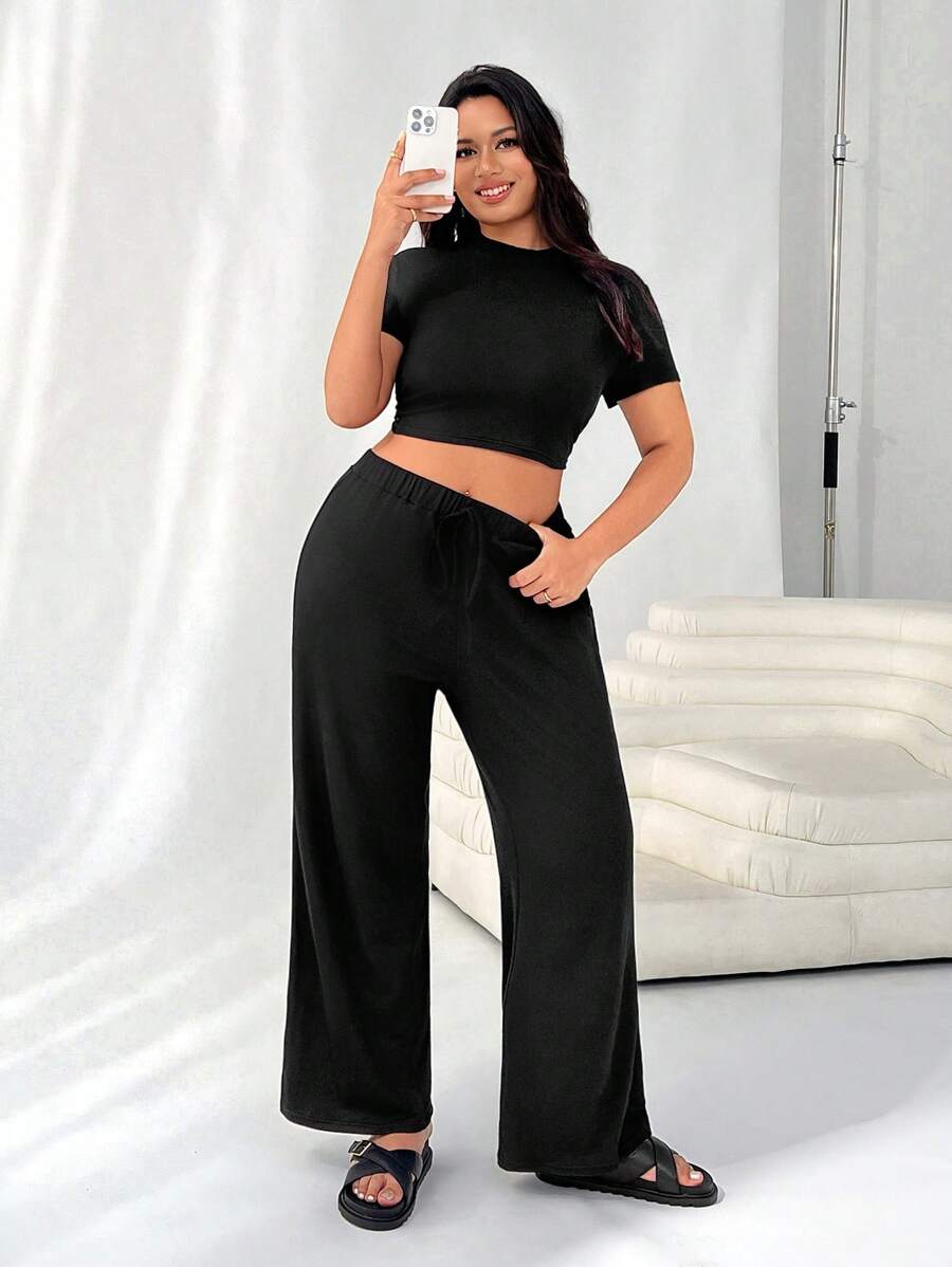 SHEIN EZwear Set de 2 piezas: Top de manga corta de punto negro y pantalones largos de talla grande - Negro - Ver 1