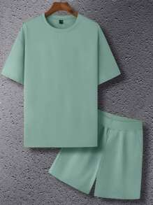 Manfinity Homme Conjunto de camiseta de unicolor y pantalón corto con cordón en la cintura para hombre, Conjunto de 2 piezas, Conjunto informal de 2 piezas para hombre, Conjunto de 2 piezas de verano para hombre