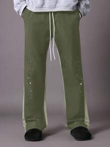 SUMWON Sporty Athletic Paint Splatter Track Pants Streetwear Flared Leg Training Workout Performance Bottoms Fall Winter Fashion Statement Piece - Army Green - View 2