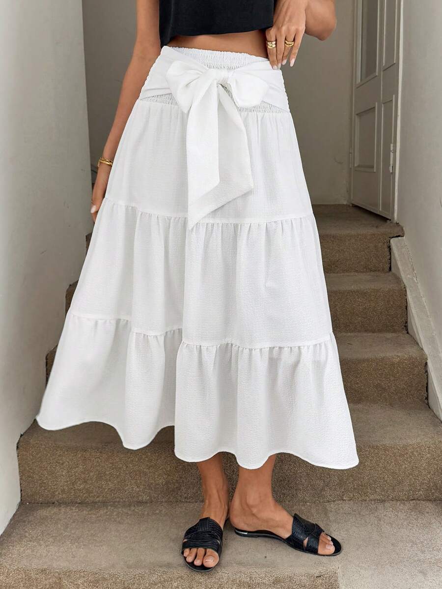 SHEIN LUNE Jupe plissée à taille haute avec nœud, ourlet multicouche en forme de A. Jupe élégante de vacances en tissu texturé pour femmes. Jupe bohème à volants pour femmes, festival rave occidental - Blanc - Voir 1