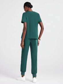 Scrubzie Button V Neck Design Four Pockets Scrub Sets Sporty Sets Comfortable Loose Beauty Salon Uniform, Nurse Short Sleeve Top & Drawstring Pants Set Women Scrubs For Women Women Scrub Sets Nurse Scrub Sets Women Scrub Sets For Women Essential Jogger Scrub Set Nursing Uniform Stretch V-Neck Top & Drawstring Cargo Pants Notch V-Neck Tuck In Top & Drawstring Straight Leg Pants Woman Scrub Set Nurse Beauty Salon Workwear Clinical Scrubs Top Pants Sets Spa Doctor Nursing Clinical Suit - Green - View 2