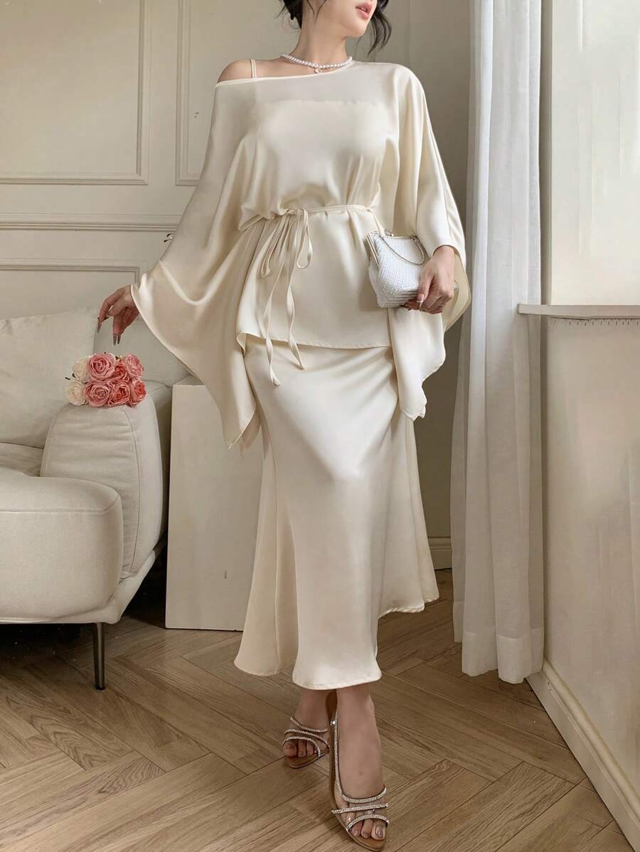 DAZY Bộ 2 món áo tay cánh dơi trơn và chân váy viền đuôi cá thanh lịch cho nữ - Màu be - Xem 1