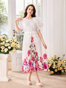 SHEIN 2-częściowy zestaw dla nastolatki: T-shirt z krótkim rękawem i okrągłym dekoltem z falbankami i spódnica plisowana z kwiatowym wzorem, wiązana w talii, wiosna/lato, elegancki, luksusowy, na imprezę, święta, podróż, urodziny - Biały - Zobacz 5