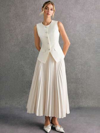 Poéselle 女士优雅杏色无袖粗花呢上衣和褶皱中长裙套装，包含一件饰有仿珍珠纽扣的无袖粗花呢背心和一条褶皱中长裙。这款精致的杏色套装散发着法式假日优雅气息，适合正式场合和约会等外出活动，以及秋冬季两件套造型。