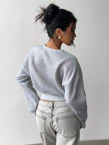 SHEIN EZwear Sudadera corta de mujer de cuello redondo, hombros caídos y manga larga en unicolor