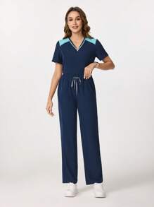 Scrubzie Colorblock Zipper V Neck Design Four Pockets Scrub Sets Sporty Sets Women's Solid Color Splice Short Sleeve Blouse And Long Pants Nursing Scrub Set For Women Scrubs For Women Scrub Sets Nurse Scrub Sets Women Scrub Sets For Women Essential Jogger Scrub Set Nursing Scrub Stretch V-Neck Top & Drawstring Cargo Pants Notch V-Neck Tuck In Top & Drawstring Straight Leg Pants - Navy Blue - View 6