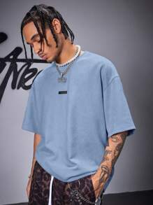 AXEPEAK Men's Street Style Gothic Letter Air Layer Suede Embossed Loose Dropped Shoulder Crew Neck Short Sleeve T-Shirt, Summer, Streetwear Essentials