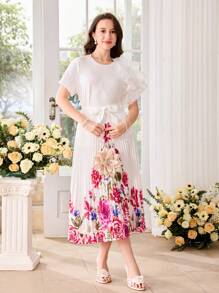 SHEIN 2-częściowy zestaw dla nastolatki: T-shirt z krótkim rękawem i okrągłym dekoltem z falbankami i spódnica plisowana z kwiatowym wzorem, wiązana w talii, wiosna/lato, elegancki, luksusowy, na imprezę, święta, podróż, urodziny - Biały - Zobacz 4