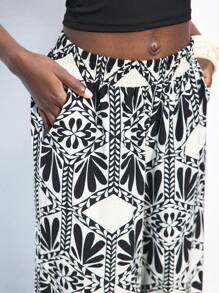 Maija Pantalones casuales sueltos, bohemios y de playa con estampado floral tropical en negro, cintura elástica con cordón, bolsillos, minimalistas y de moda para uso diario y exterior en verano