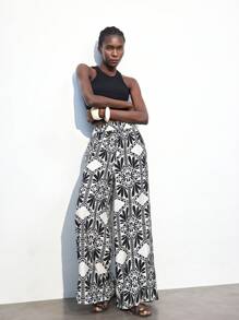 Maija Pantalones casuales sueltos, bohemios y de playa con estampado floral tropical en negro, cintura elástica con cordón, bolsillos, minimalistas y de moda para uso diario y exterior en verano