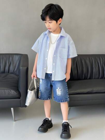 年轻男孩宽松直筒洗水做旧牛仔短裤，时尚休闲街头风格牛仔短裤