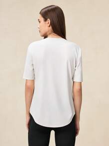 OutZeal Camiseta de mujer de manga corta, ajuste regular, con tela refrescante, ideal para entrenamiento y actividades al aire libre con protección solar