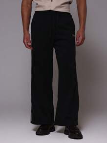 Musero Pantalón de chándal de pierna ancha con parche de marca, cintura elástica con cordón, para el armario de primavera y verano - Negro - Ver 2