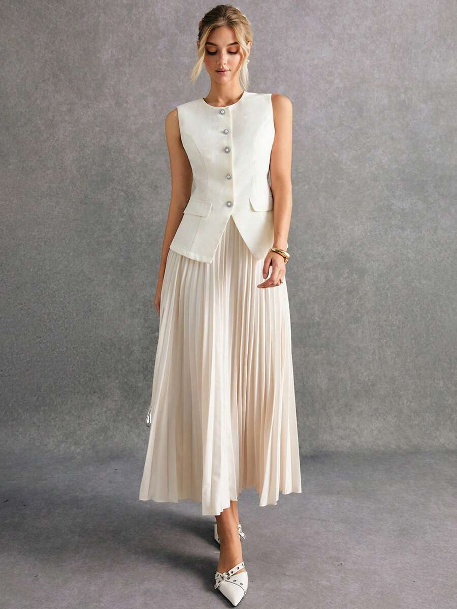 Poéselle 女士优雅杏色无袖粗花呢上衣和褶皱中长裙套装，包含一件饰有仿珍珠纽扣的无袖粗花呢背心和一条褶皱中长裙。这款精致的杏色套装散发着法式假日优雅气息，适合正式场合和约会等外出活动，以及秋冬季两件套造型。 - 米色 - 查看 1