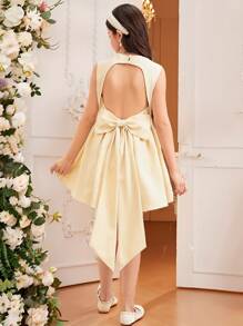 SHEIN Vestido elegante y de color amarillo pato para niñas preadolescentes, con cuello cuadrado de unicolor, sin mangas, espalda descubierta, decorado con gran lazo y empalme en forma de V. Vestido francés elegante y a la moda, ideal para volver al colegio, apropiado para graduaciones, bailes de promoción y fiestas de cumpleaños.