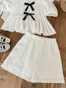 SHEIN 2pcs/Set Tween Girls Woven Textured Round Neck Bow Decor Casual Short Sleeve Cropped Top And Bow Shorts Set, Back To School, Casual Vacation, Daily Wear