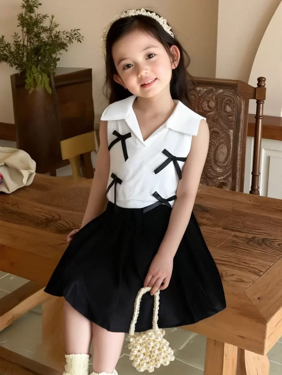 Set de 2 piezas: Chaleco con cuello de lazo 3D y falda plisada, conjunto adecuado para el estilo escolar de verano para niña joven