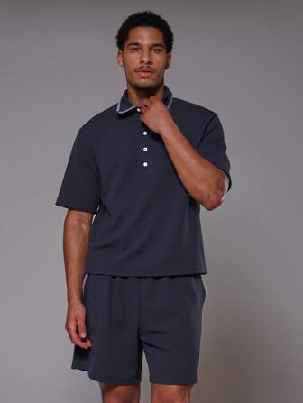 Musero Chemise polo à manches courtes surdimensionnée avec poche brodée "Musero" seulement