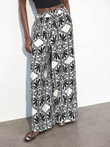 Maija Pantalones casuales sueltos, bohemios y de playa con estampado floral tropical en negro, cintura elástica con cordón, bolsillos, minimalistas y de moda para uso diario y exterior en verano