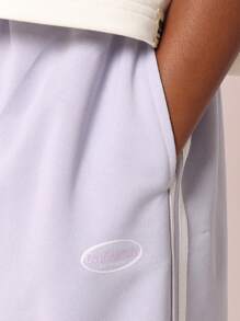 SUMWON Set di top corto e pantaloncini atletici per giovani, abbigliamento estivo a due pezzi, per allenamento, workout, casual, streetwear, con logo farfalla coordinato - Viola - Visualizzare 6