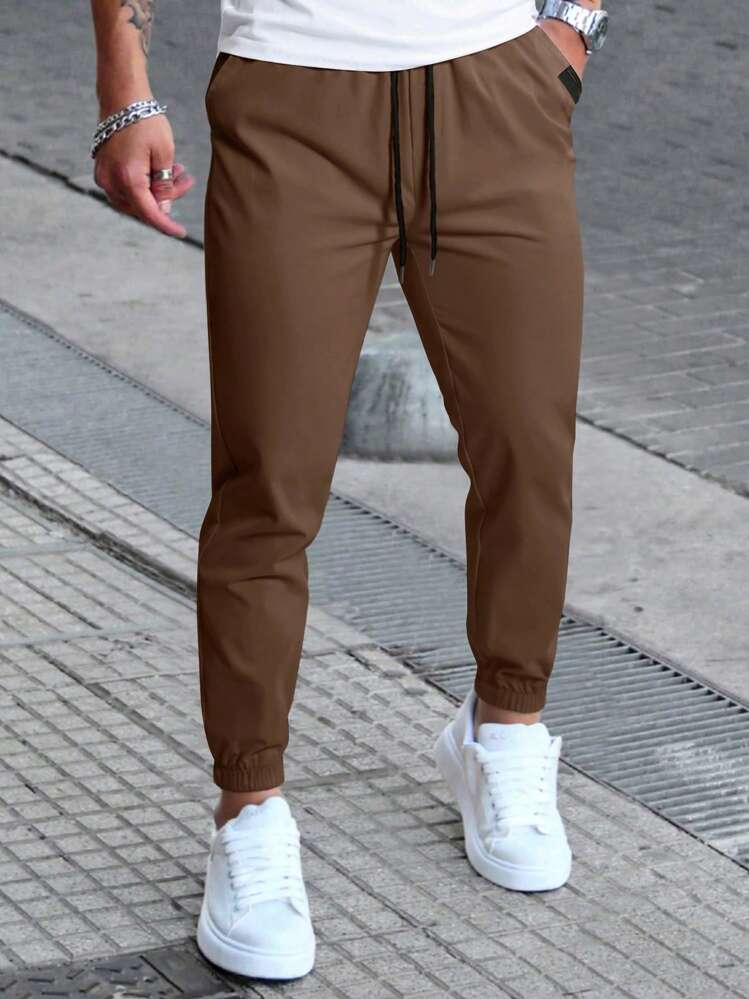 Manfinity Homme Pantalones casuales de hombre con cintura con cordón y corte entallado, otoño - Café integral - Añade 1