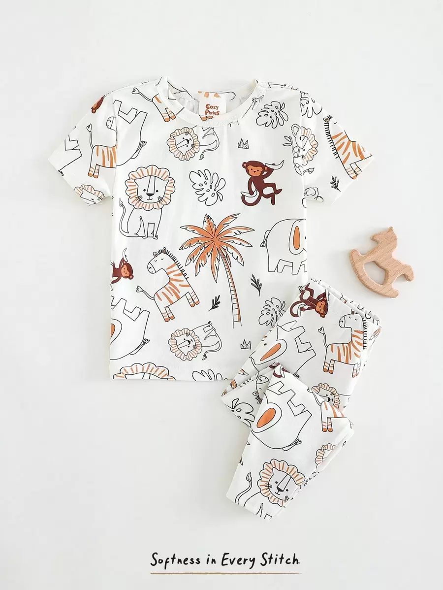 Cozy Pixies 2pcs Baby Boy Snug Fit Pajamas Set, Cartoon Animal Graphic Soft Knit Round Neck Short Sleeve Top And Elastic Waist Long Pants - White - View 1