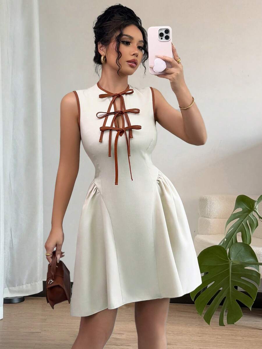 Elenzga Váy ngắn mới dành cho nữ có cổ khoét sâu, thiết kế nơ buộc tương phản, eo và viền nhún, vải có họa tiết, khóa kéo sau lưng, thời trang, trẻ trung & thanh lịch, thích hợp cho tiệc tùng, hẹn hò, mặc hàng ngày, vừa vặn, xuân/hè - Màu be - Xem 1