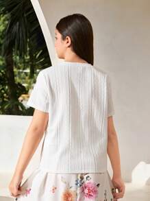 Top de manga corta y cuello redondo ajustado de tejido jacquard con decoración de lazo colorido, apropiado para primavera/verano, salidas de primavera, y vuelta al colegio, para niñas preadolescentes - Blanco - Ver 8