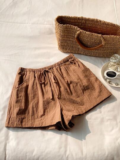 SHEIN Comfortcana Shorts de Florida con nudo frontal sólido, diseño sencillo y de moda, adecuados para el verano