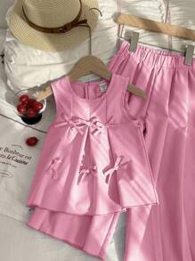 Genkimix Kids Set de 2 piezas de top sin mangas con pliegues y lazo en color morado sólido, y pantalones holgados con pliegues, un conjunto de ropa de verano estiloso para niñas jóvenes