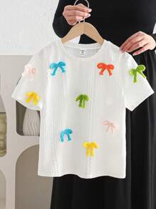 Top de manga corta y cuello redondo ajustado de tejido jacquard con decoración de lazo colorido, apropiado para primavera/verano, salidas de primavera, y vuelta al colegio, para niñas preadolescentes - Blanco - Ver 3