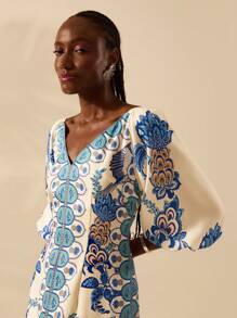 CAJUNI 女士波西米亚风格热带花卉印花 V 领泡泡袖宽松连衣裙