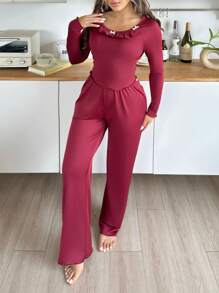 Women's Ruffle Hem Long Sleeve Top And Flared Pants Pajama Set