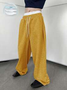 Manfinity Hypemode Pantalones de chándal de pierna ancha con cordón en la cintura para hombres, pantalones anchos y sueltos tipo jogger, pantalones holgados de color negro Y2K para hombres