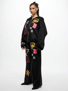SUMWON WOMEN 大学徽章贴片慢跑运动裤学院运动贴花运动休闲运动裤复古字母风格校园休闲街头休闲舒适宽松秋冬 - 黑色 - 查看 4