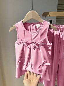 Genkimix Kids Set de 2 piezas de top sin mangas con pliegues y lazo en color morado sólido, y pantalones holgados con pliegues, un conjunto de ropa de verano estiloso para niñas jóvenes