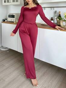 Women's Ruffle Hem Long Sleeve Top And Flared Pants Pajama Set