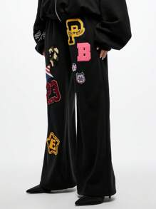 SUMWON WOMEN 大学徽章贴片慢跑运动裤学院运动贴花运动休闲运动裤复古字母风格校园休闲街头休闲舒适宽松秋冬 - 黑色 - 查看 6