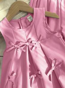 Genkimix Kids Set de 2 piezas de top sin mangas con pliegues y lazo en color morado sólido, y pantalones holgados con pliegues, un conjunto de ropa de verano estiloso para niñas jóvenes