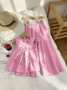 Genkimix Kids Set de 2 piezas de top sin mangas con pliegues y lazo en color morado sólido, y pantalones holgados con pliegues, un conjunto de ropa de verano estiloso para niñas jóvenes
