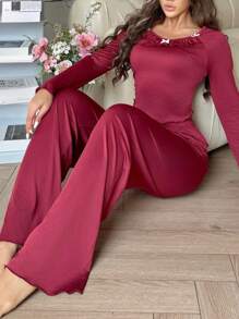 Women's Ruffle Hem Long Sleeve Top And Flared Pants Pajama Set